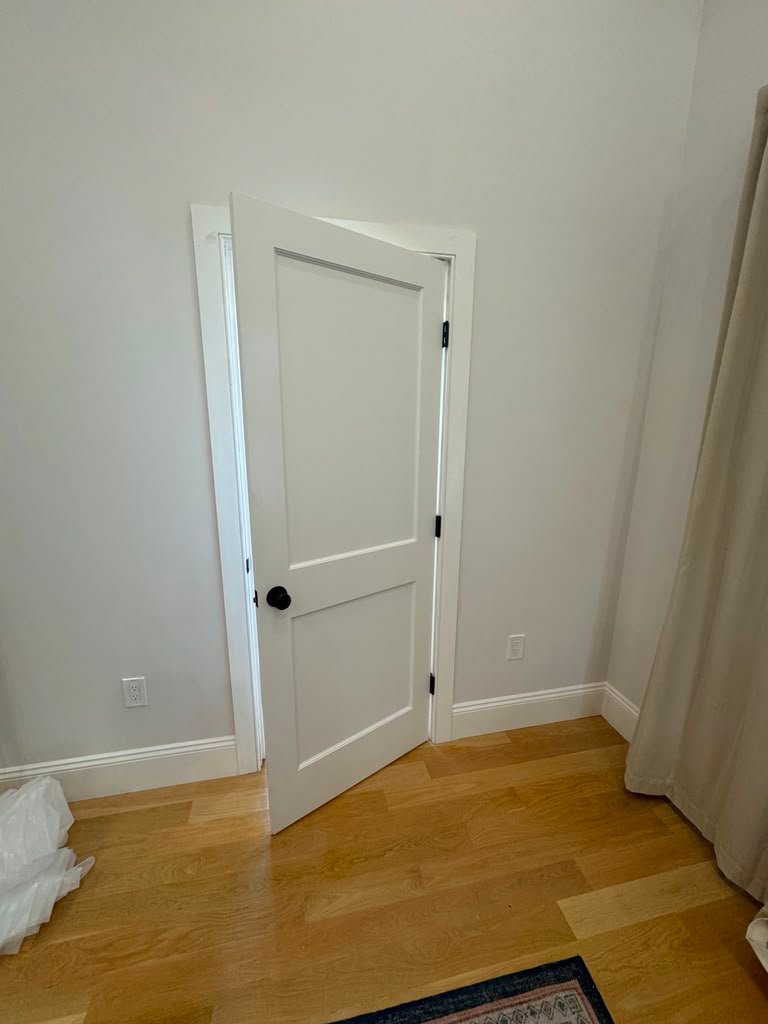 Finished interior door installation
