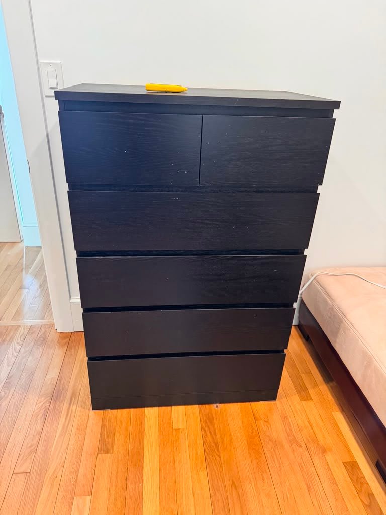 Black dresser furniture assembly