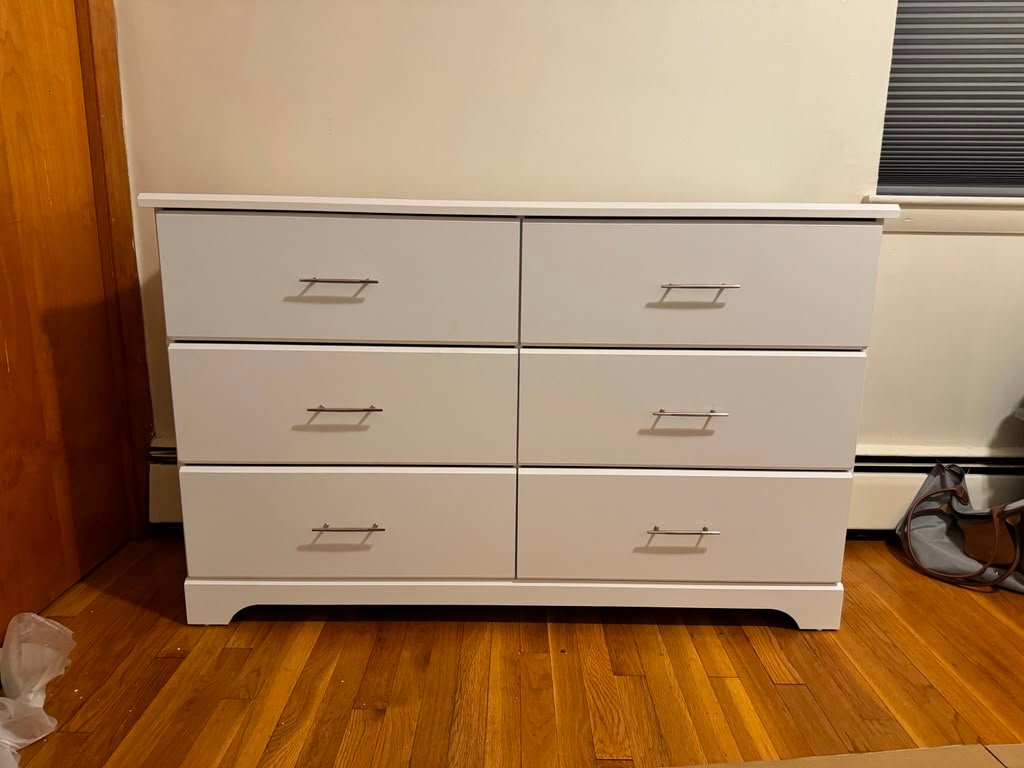 White six-drawer dresser furniture assembly