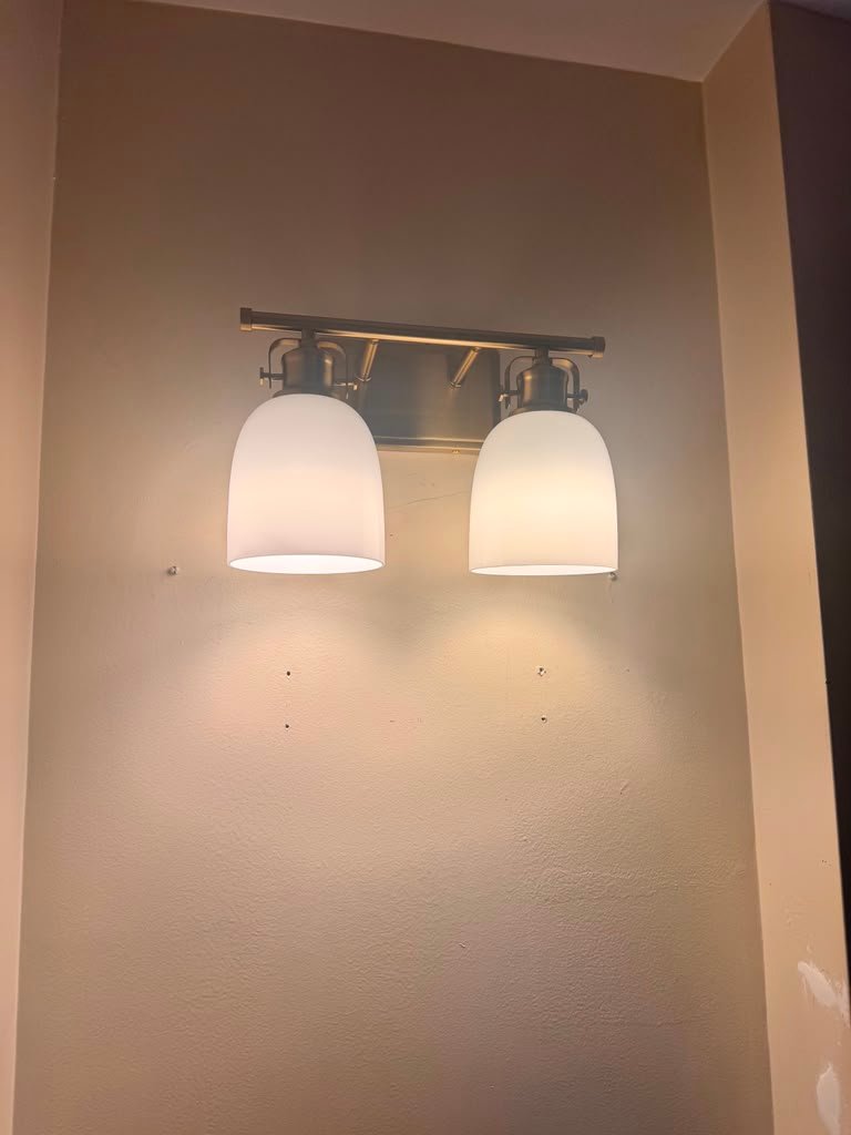 Two-light wall fixture installation