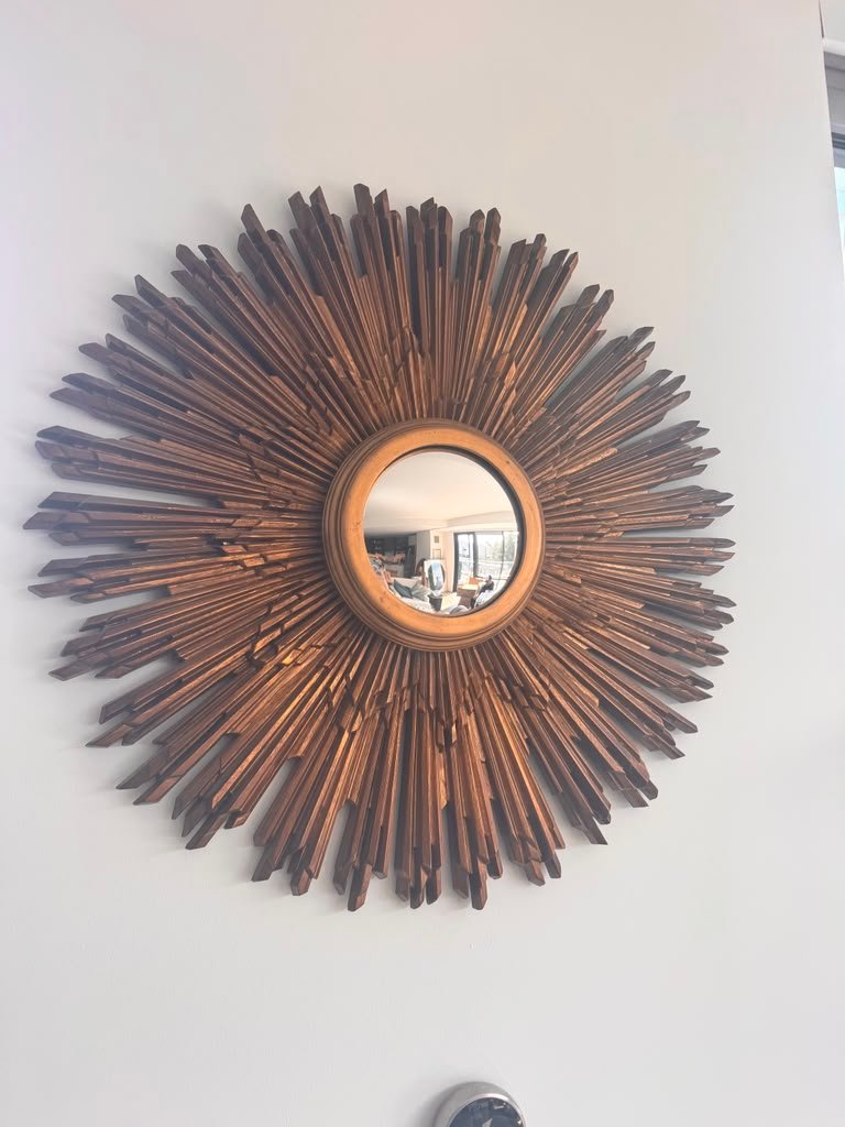 Sunburst mirror installation