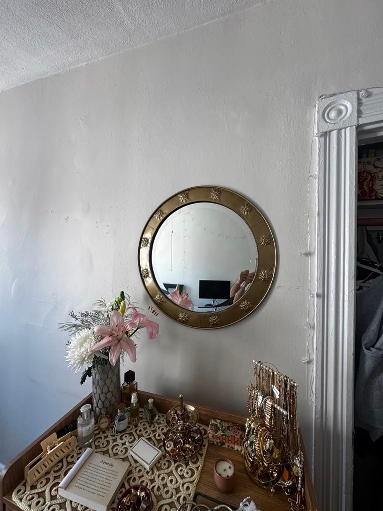Small round vanity mirror installation