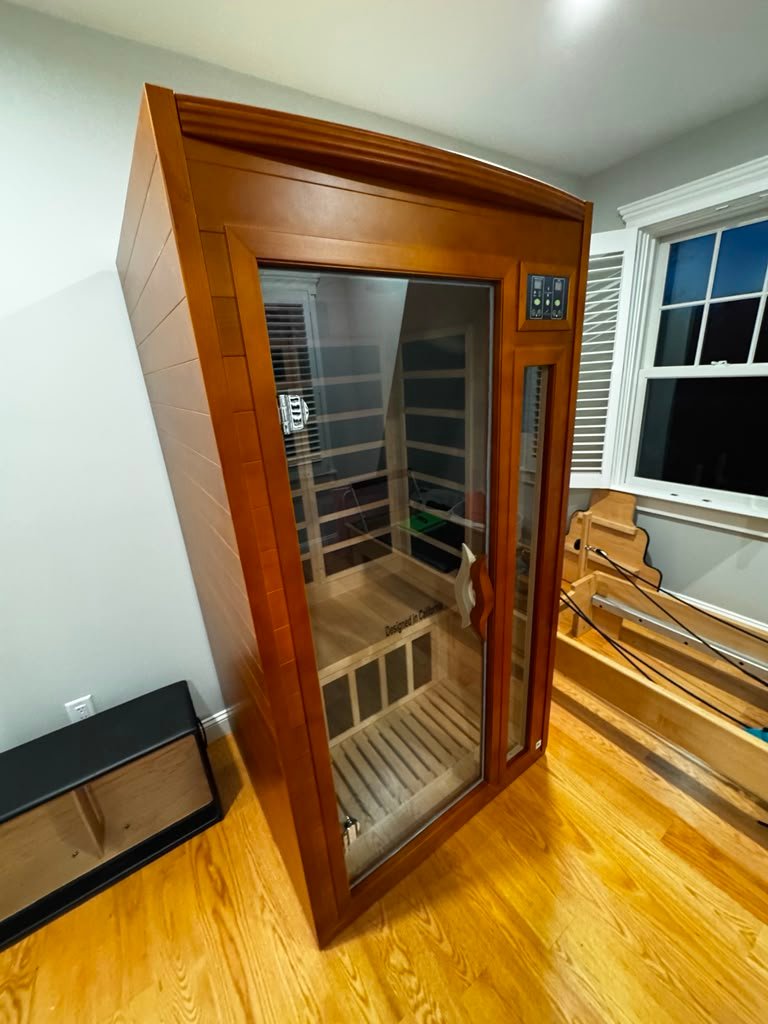 Wood indoor sauna assembly