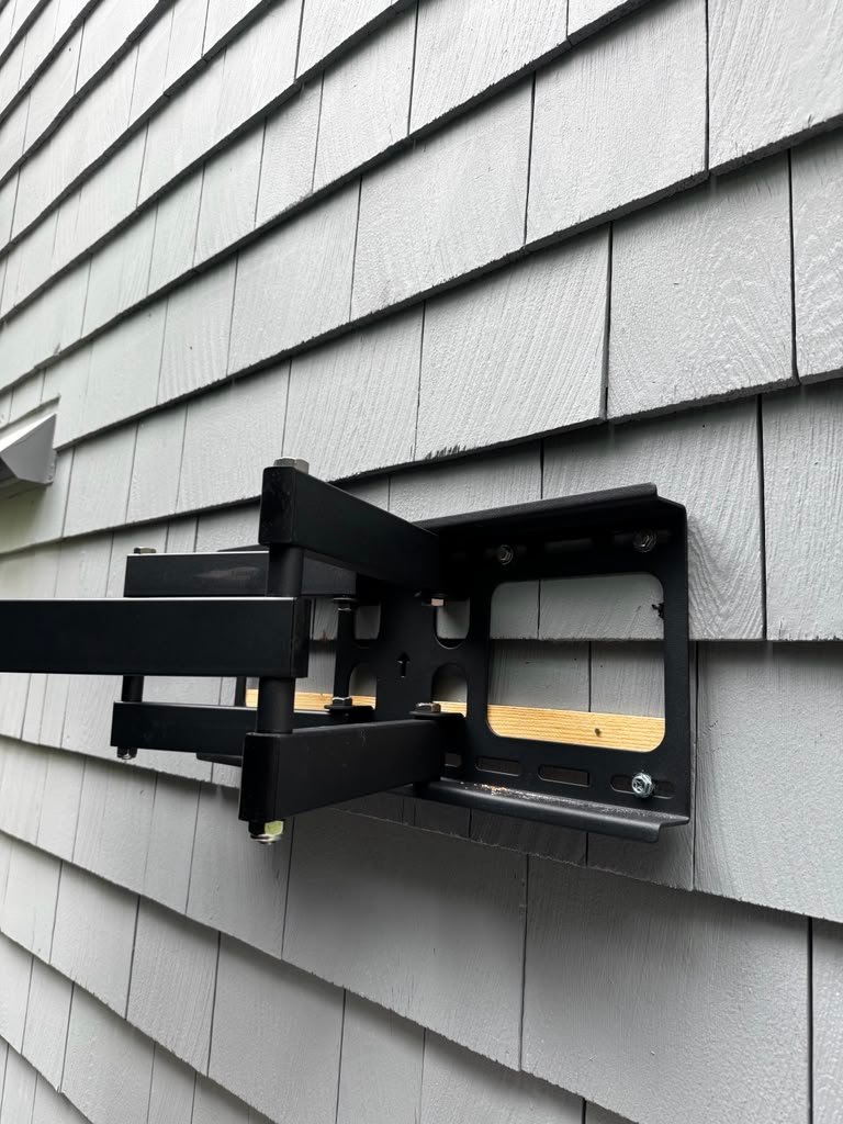 Outdoor TV mount bracket installation