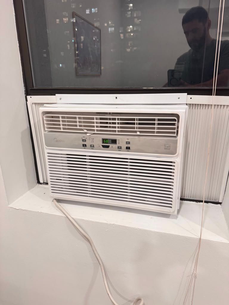 Window AC installation in apartment window