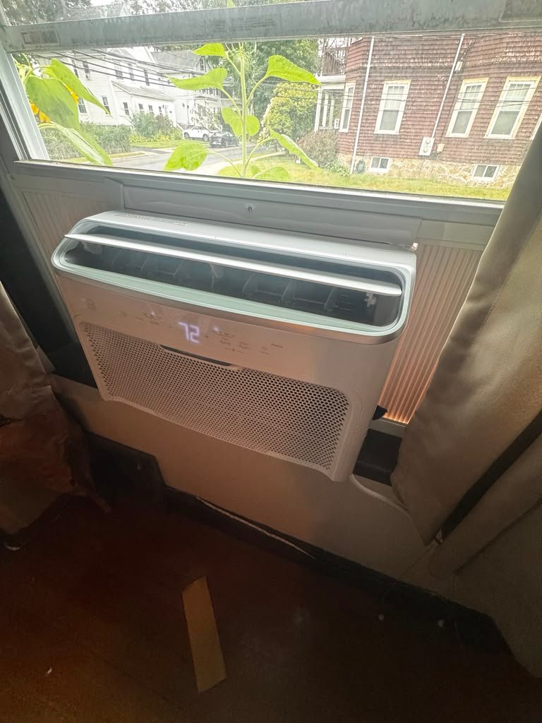 Window AC installation with open sash